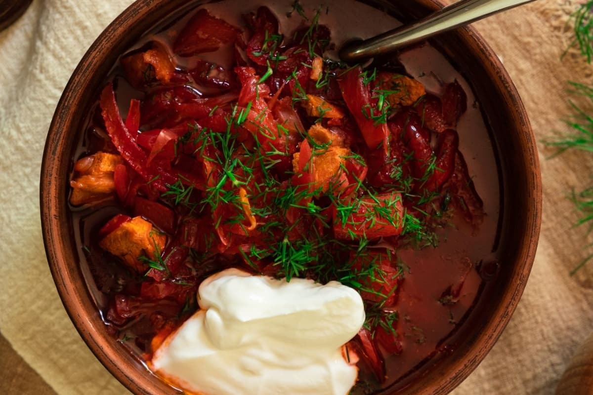 Overhead image of a bowl of borscht.