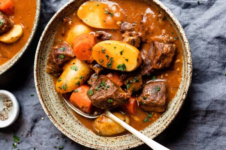 A bowl of chunky dutch oven beef stew.