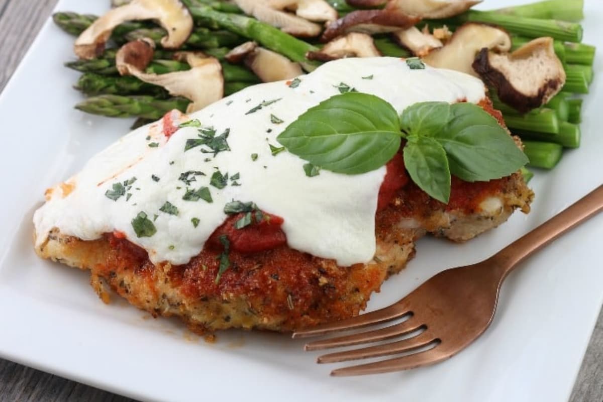 A plate of keto parmesan chicken.