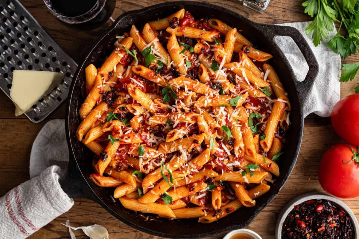 Overhead image of a pot of penne arrabbiata.