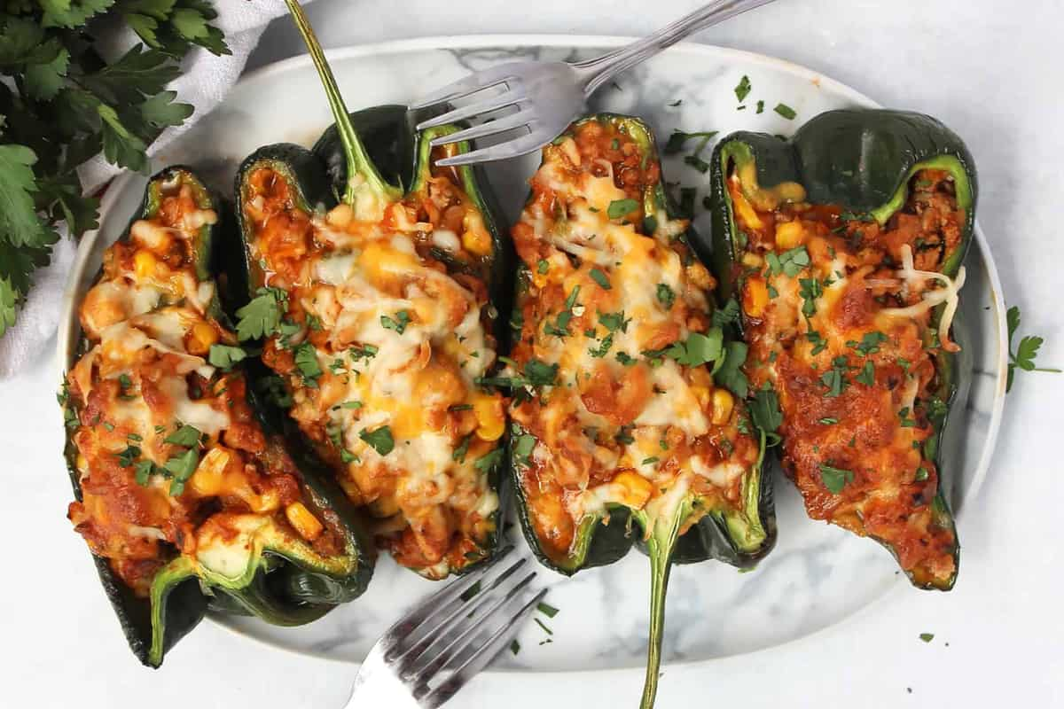 A platter of stuffed peppers.