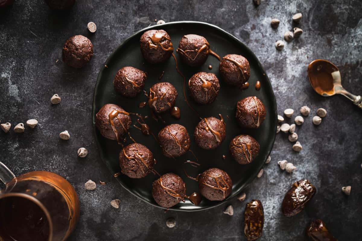 A plate of chocolate date balls.