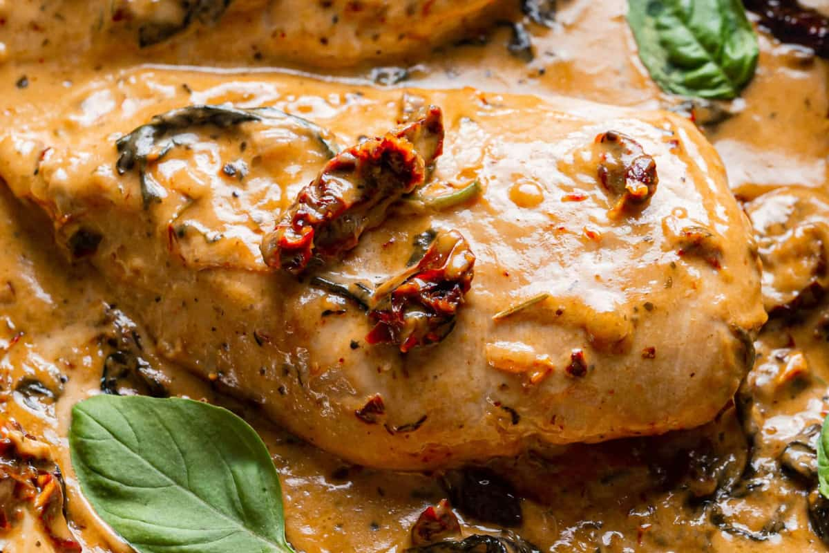 A plate of skillet tuscan chicken.