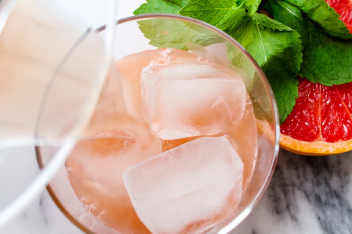 A glass of grapefruit juice.