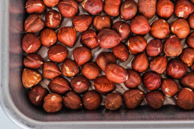 A tray of roasted hazelnuts.