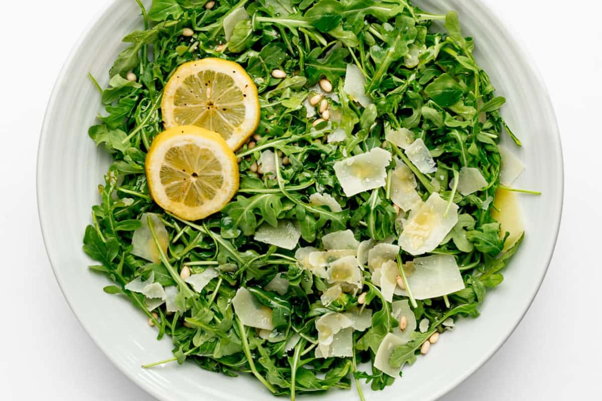 A plate of arugula salad.