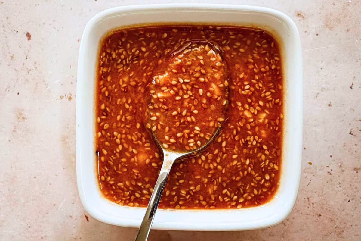 A dish of asian sesame dressing.