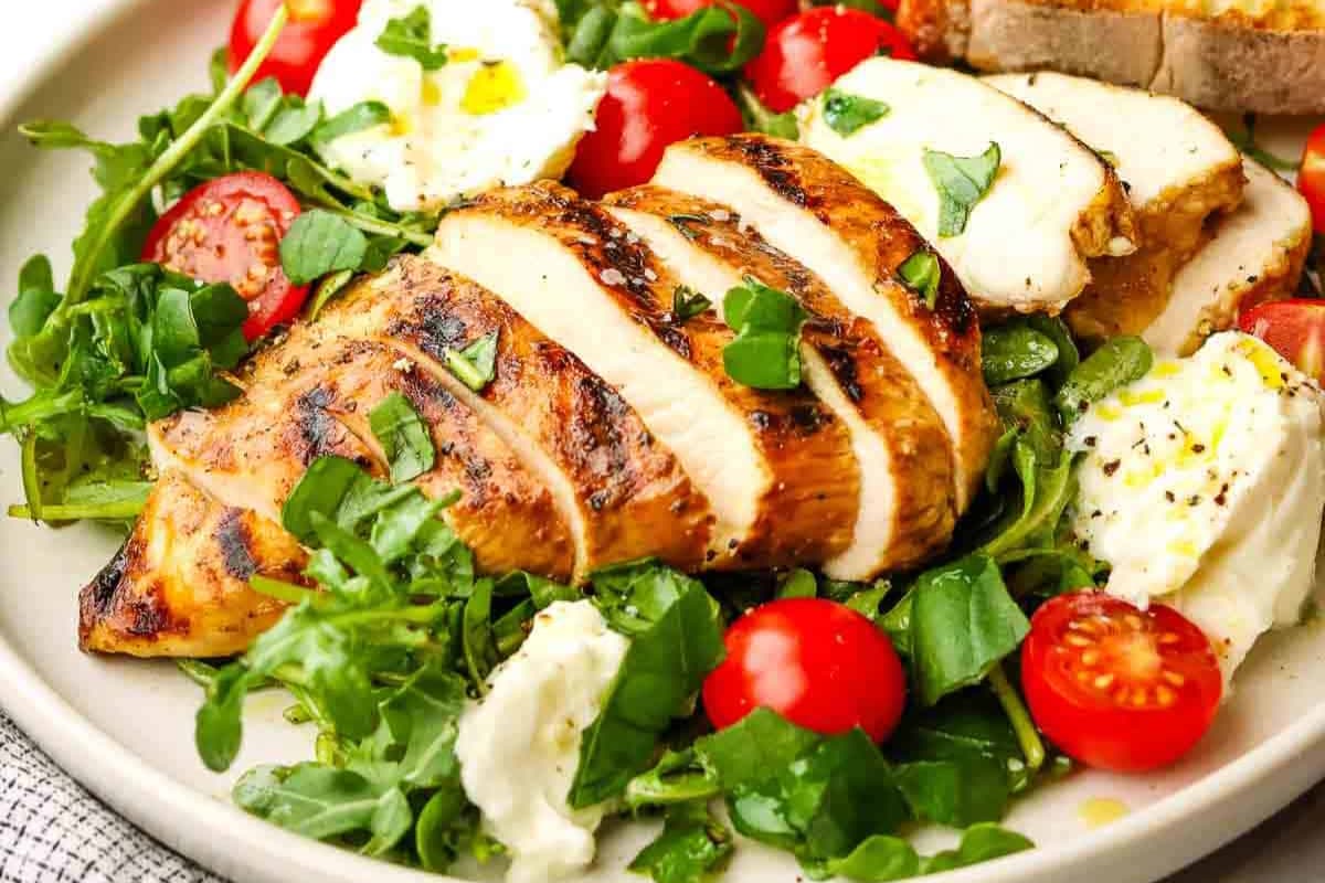 A plate of balsamic chicken breast salad.