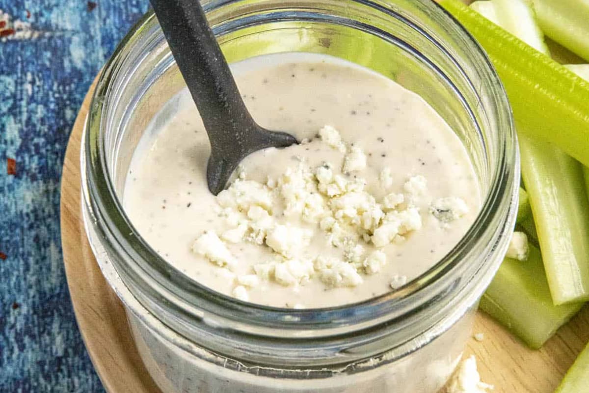 A jar of blue cheese dressing.