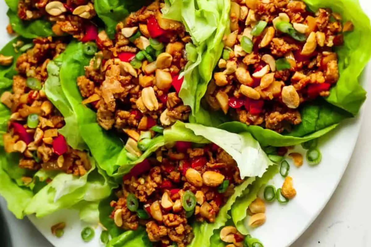 A plate of chicken lettuce wraps.