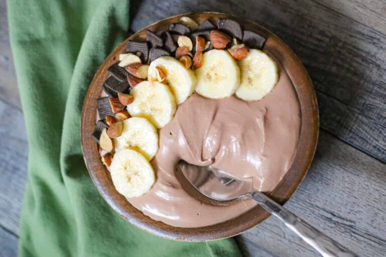 Overhead image of a chocolate protein smoothie bowl.