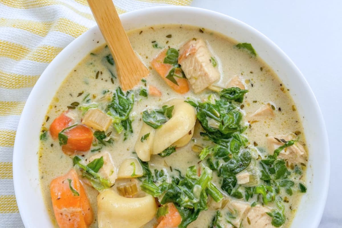 A bowl of creamy chicken tortellini.