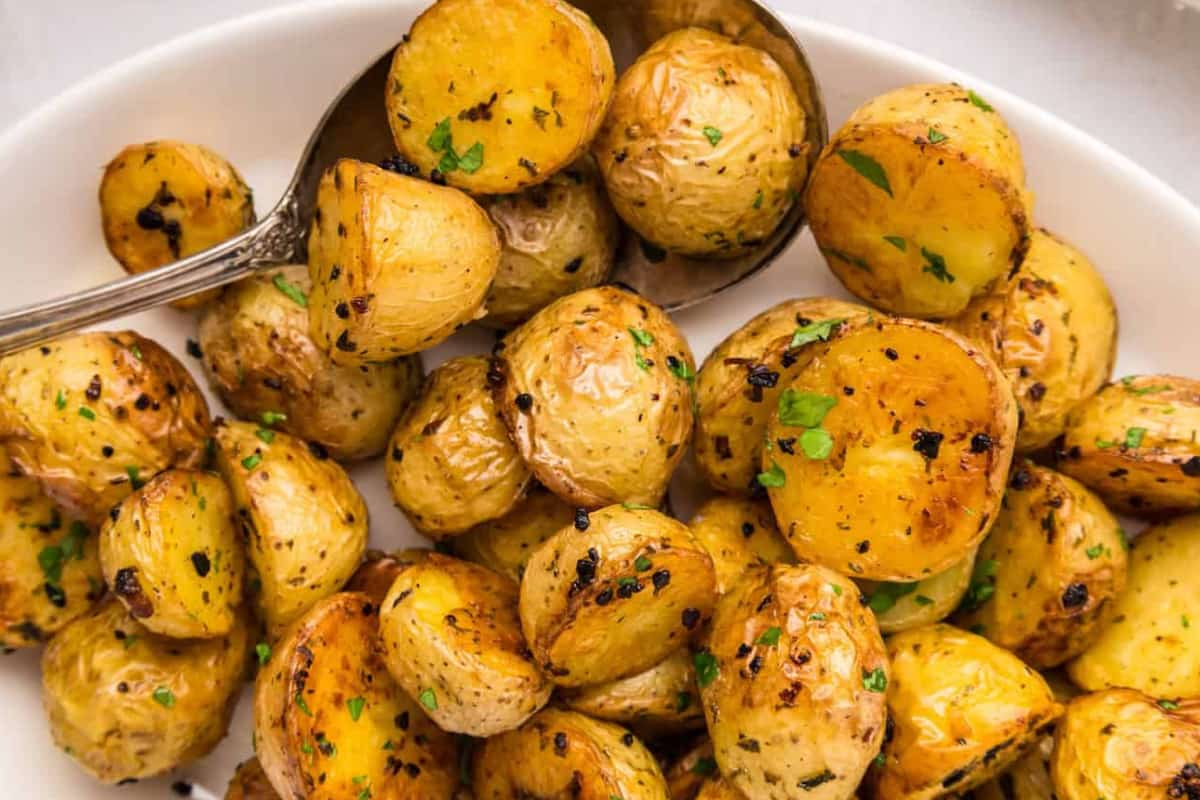 A plate of garlic roasted potatoes.