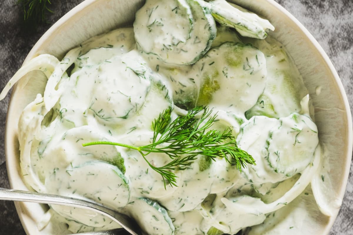 A plate of german cucumber salad.