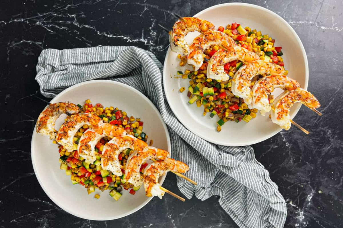 Overhead image of grilled shrimp skewers.