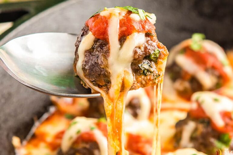 A spoon of low carb meatball casserole.