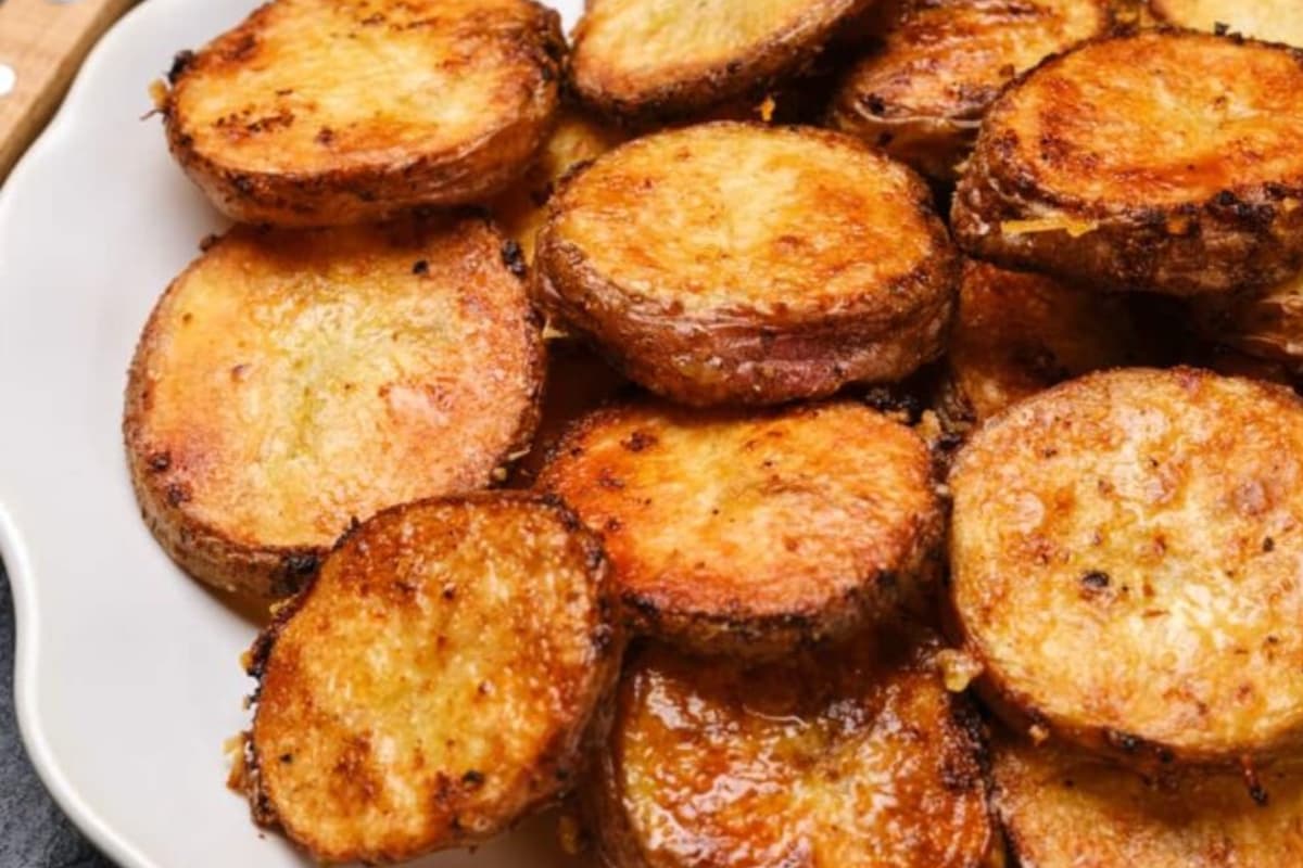 A plate of parmesan roasted potatoes.