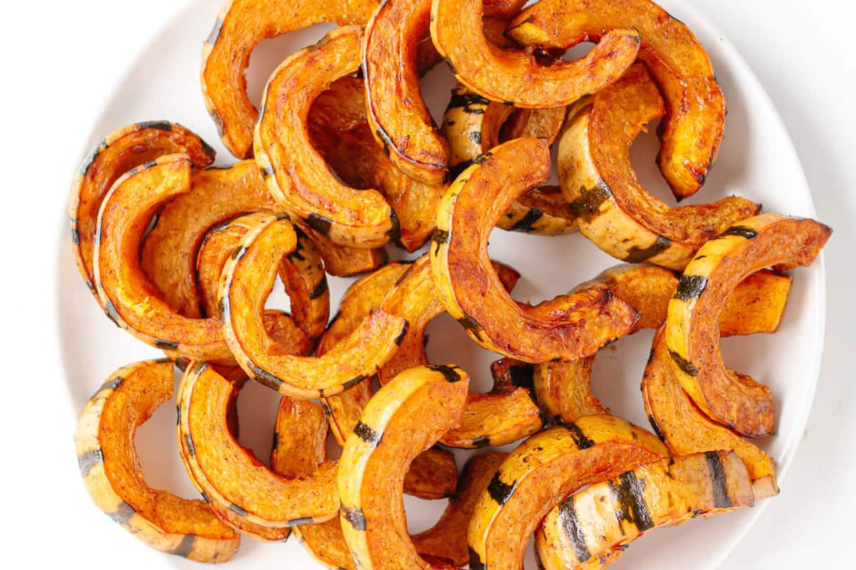 A plate of roasted delicata squash.