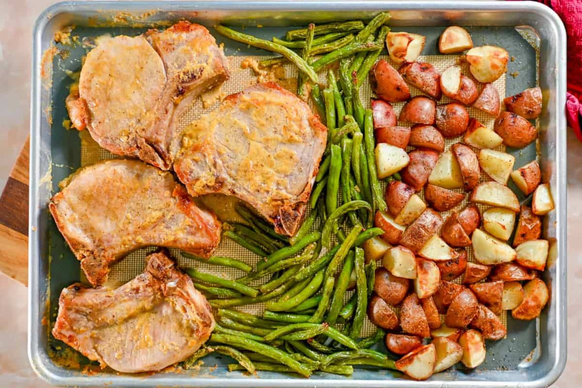 A sheet pan of dijon pork chops.