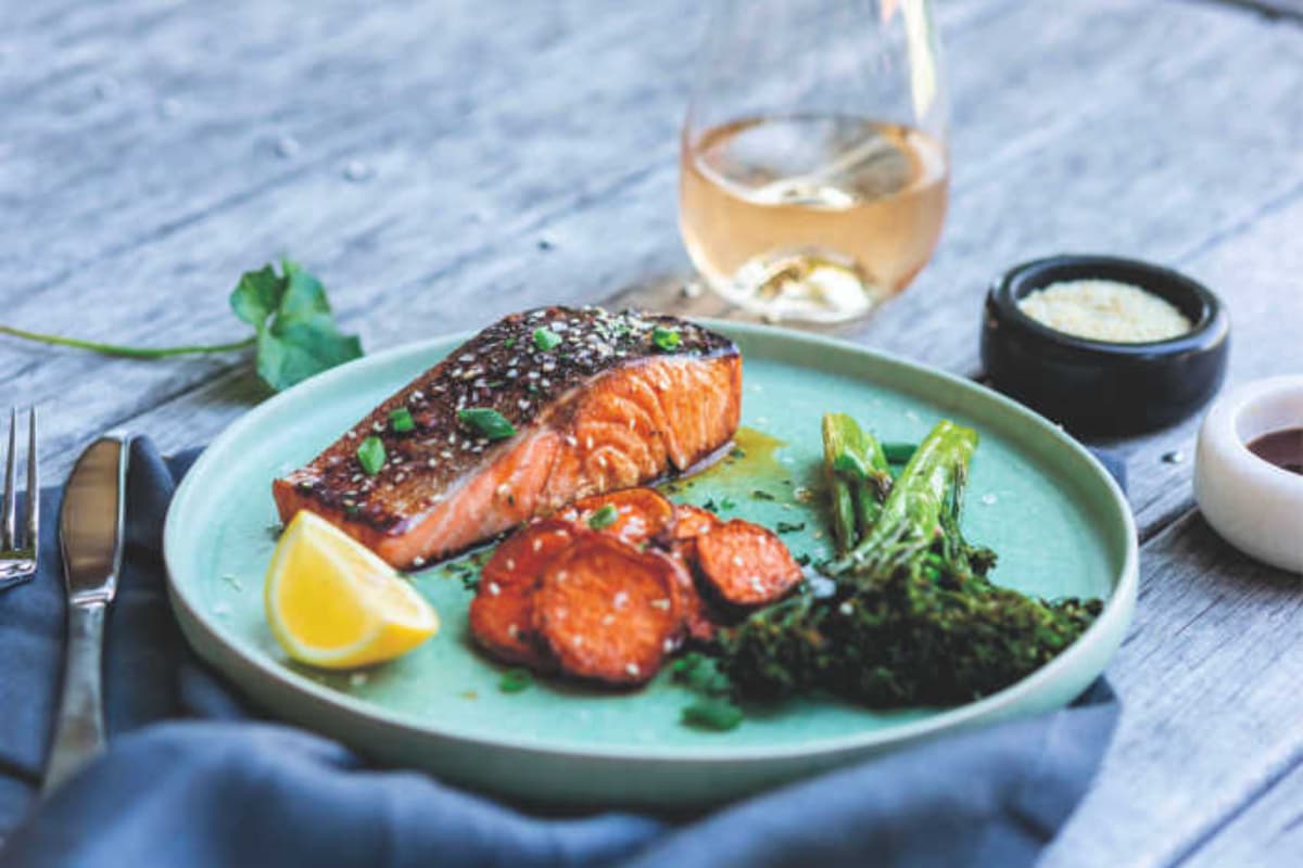 A plate of sheet pan salmon.