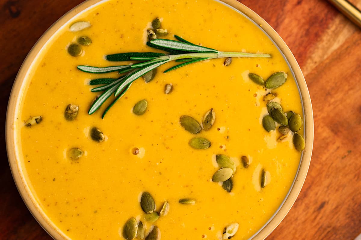 A bowl of sweet potato feta soup.