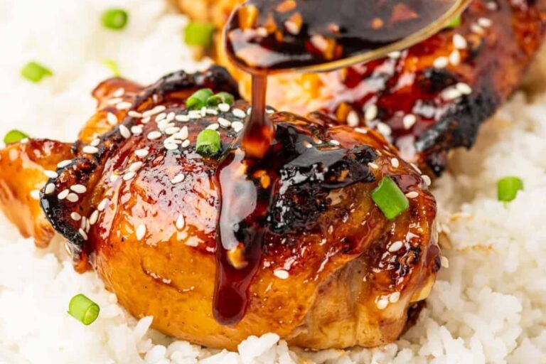 A plate of teriyaki chicken thighs.