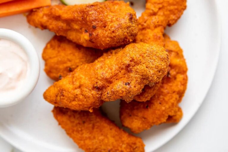 A plate of air fryer spicy buffalo chicken tenders.