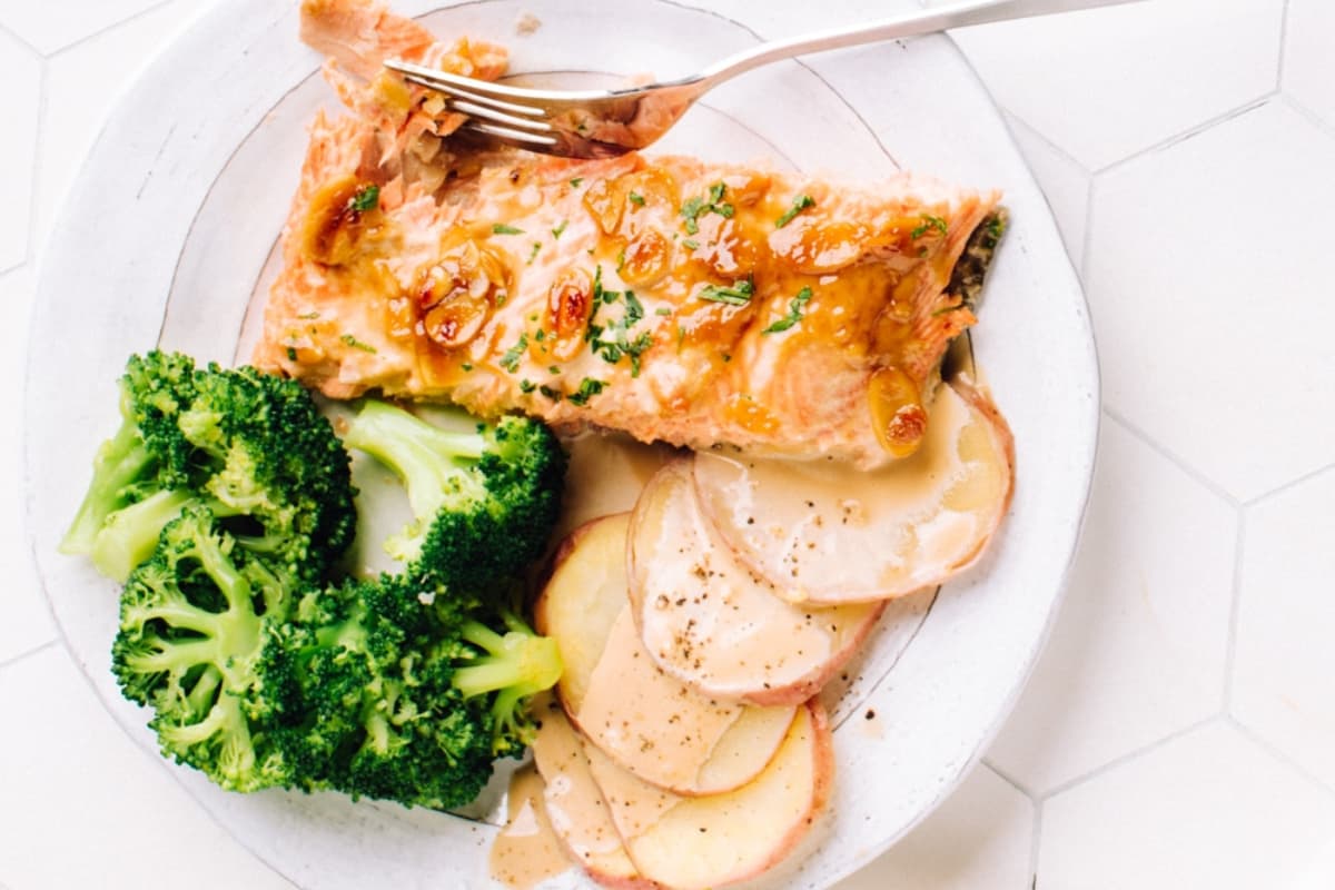 A plate of flaky baked salmon.