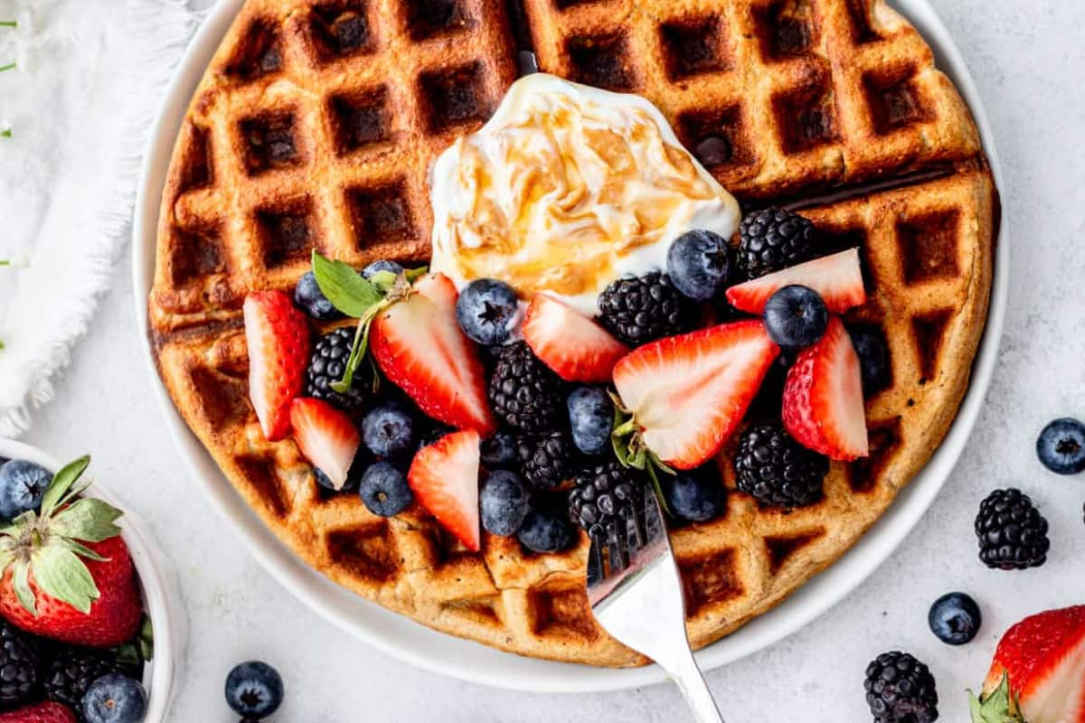 A plate of banana oatmeal waffles.