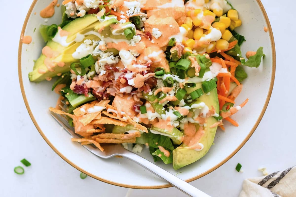 A bowl of buffalo chicken salad.