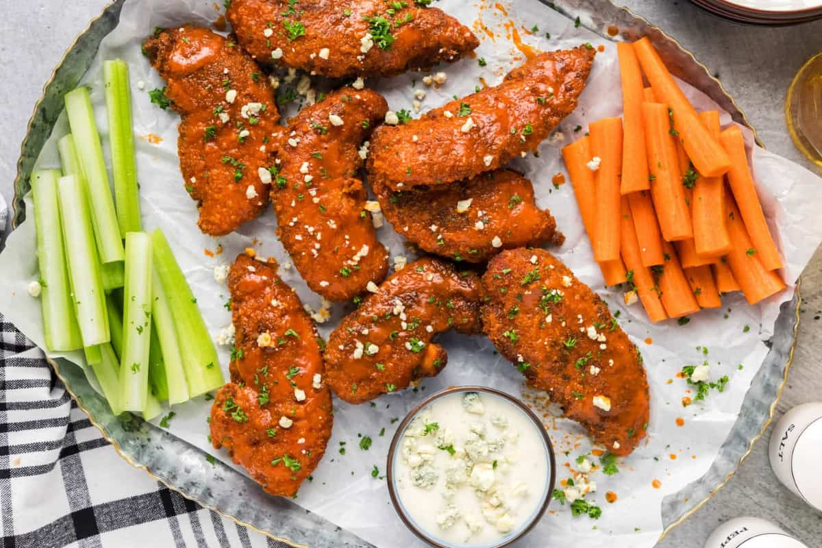 A platter of buffalo chicken tenders.