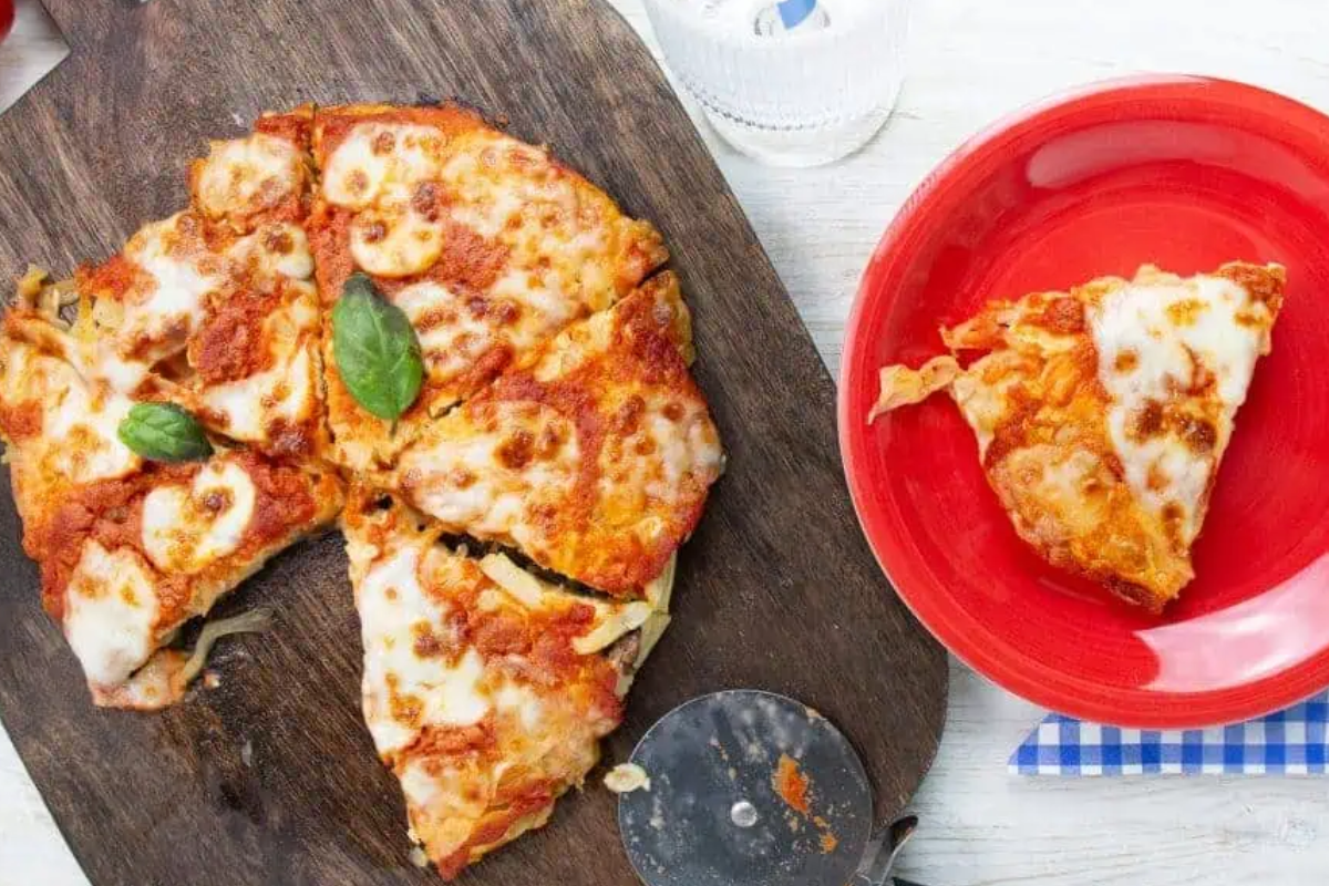 A cabbage pizza on a plate.