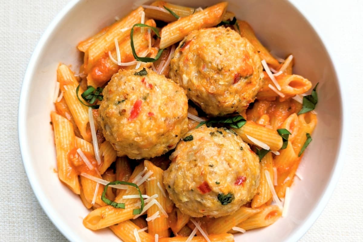 A bowl of calabrian chicken meatballs.