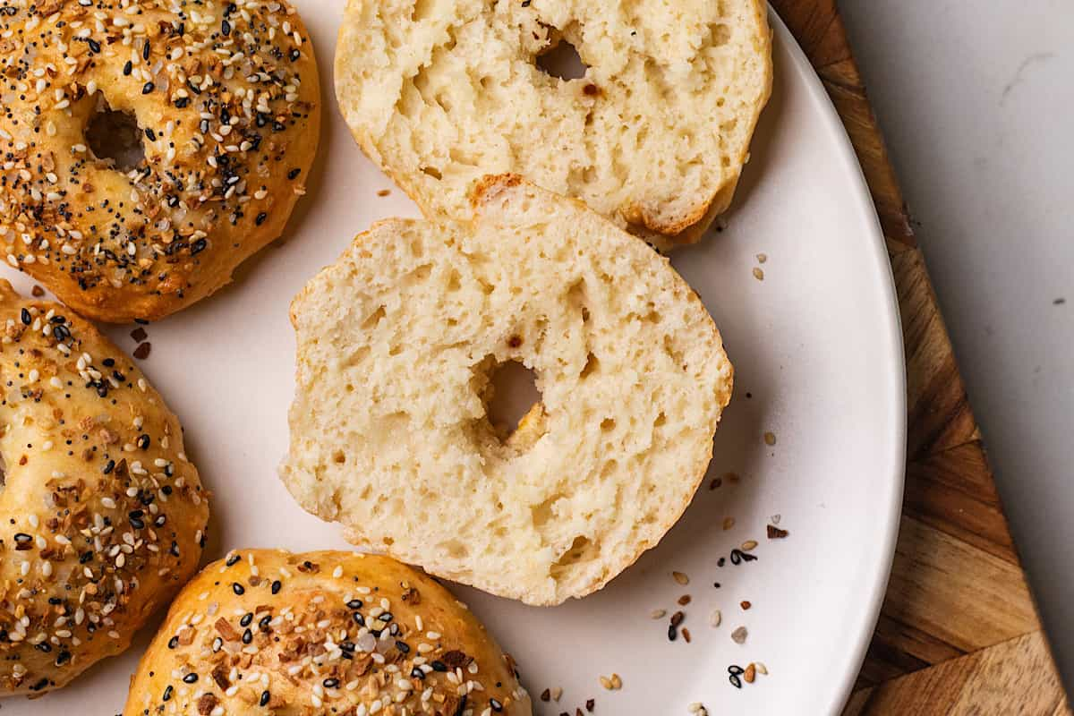 A plate of cottage cheese bagels.