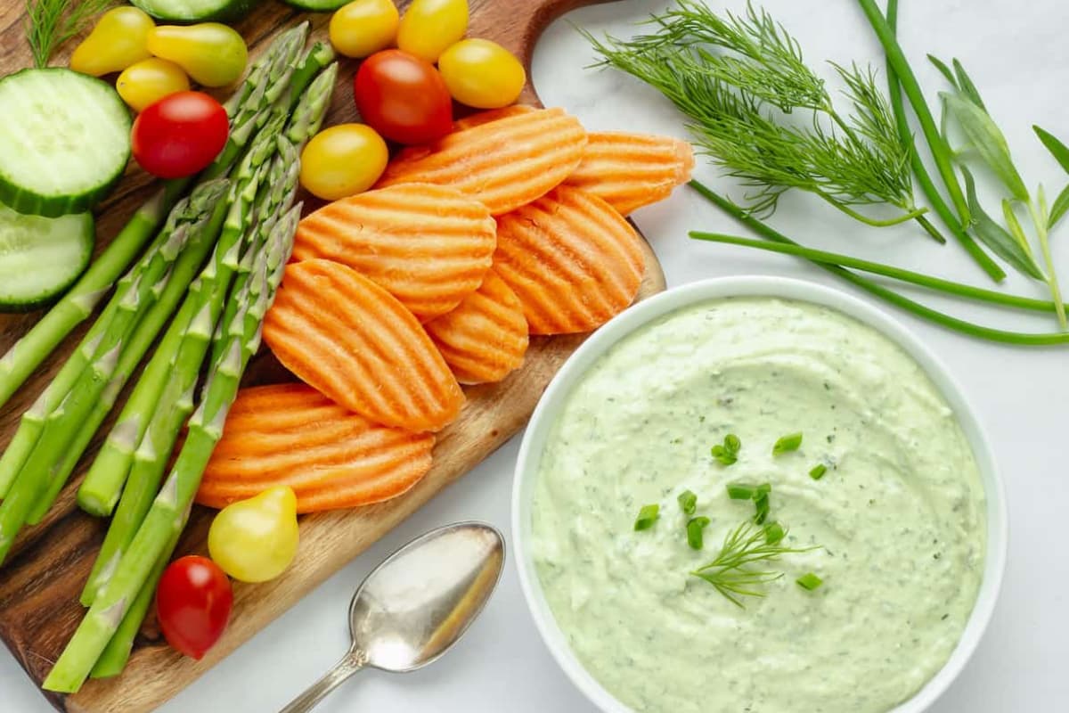 A dish of greek yogurt green goddess dip.