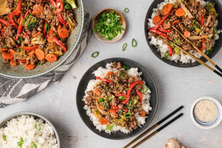 Overhead image of ground beef stir fry bowls.