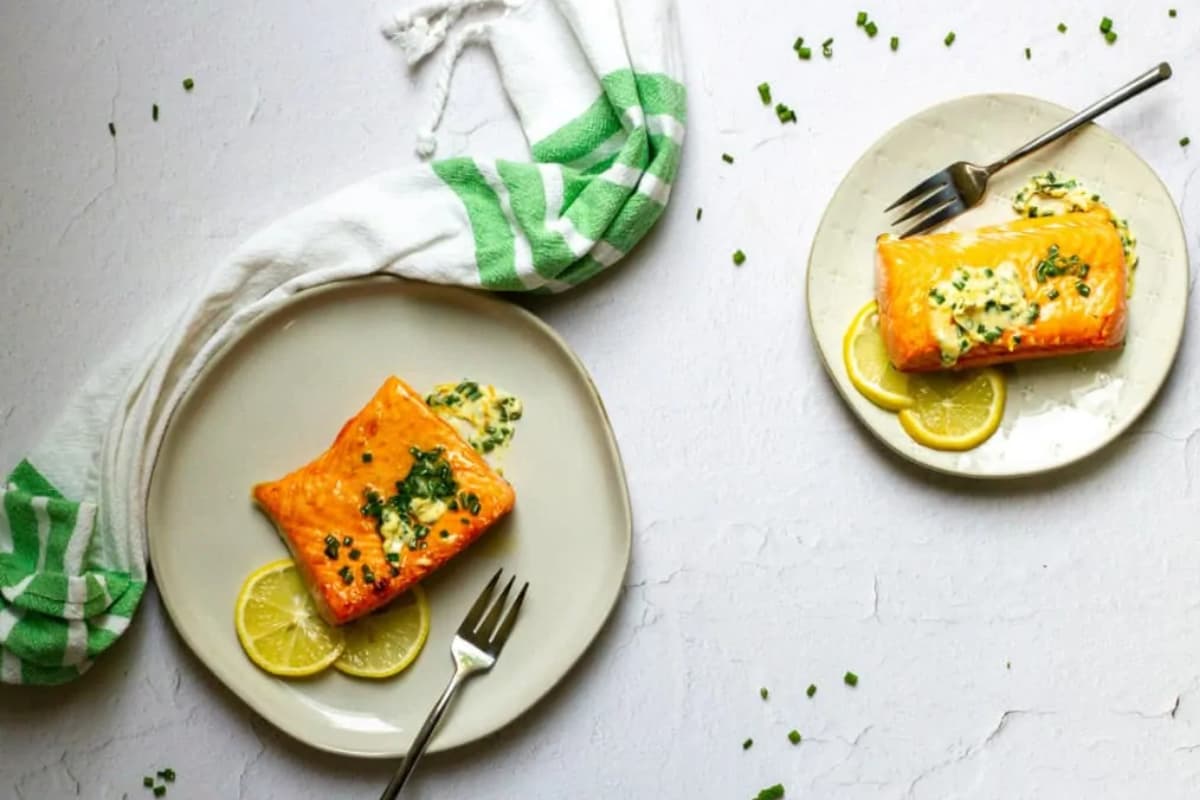 A plate of herb butter salmon.