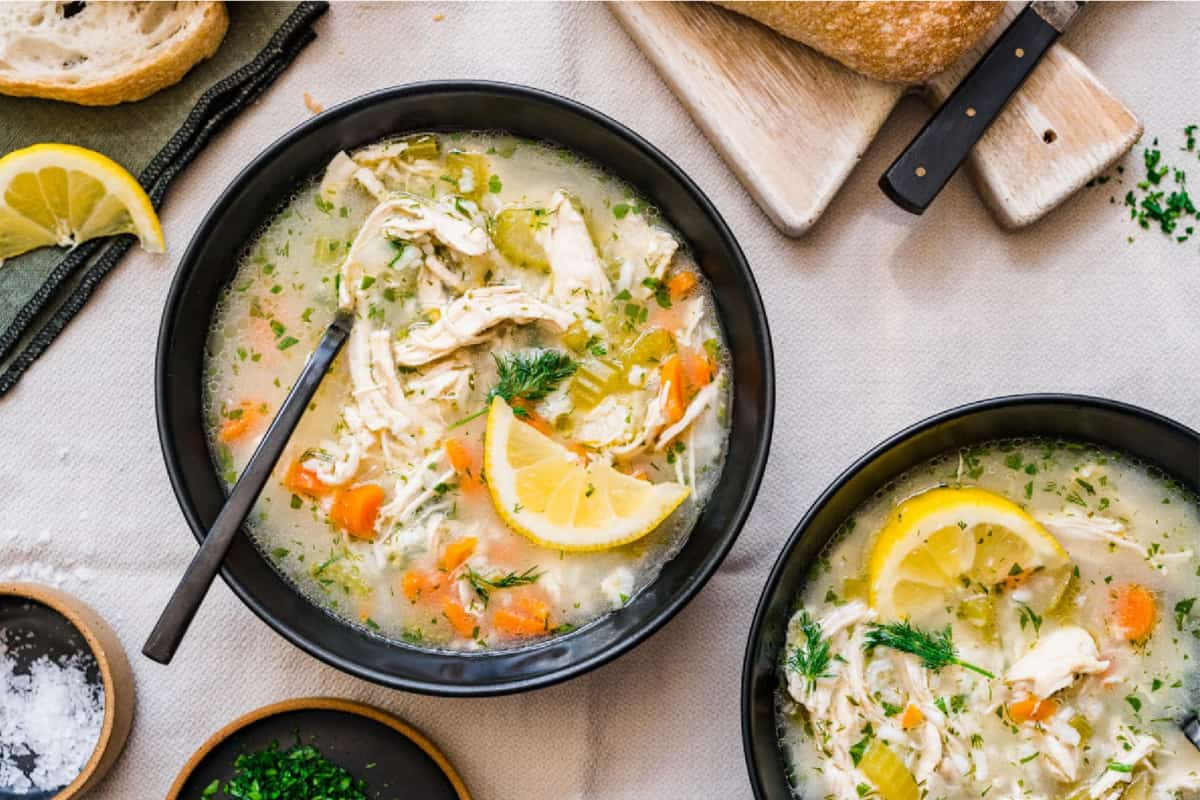 A bowl of lemon chicken soup.