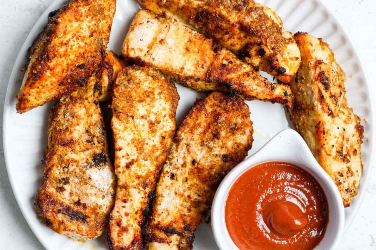 A plate of low carb air fryer chicken tenders.