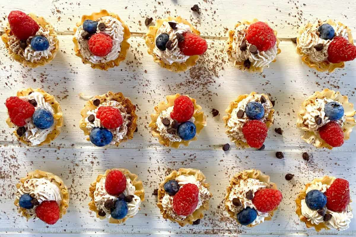 A tray of no-bake cheesecake cups.