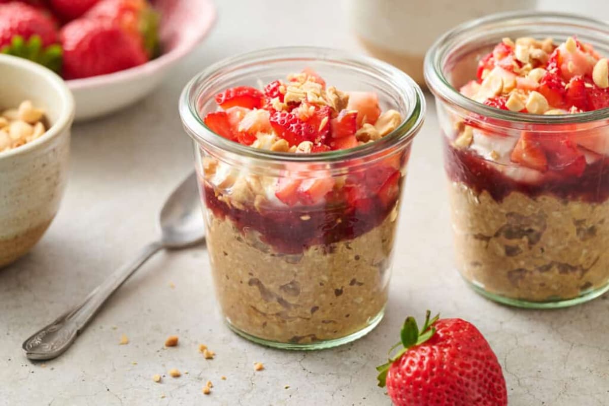 A jar of protein peanut butter and jelly overnight oats.