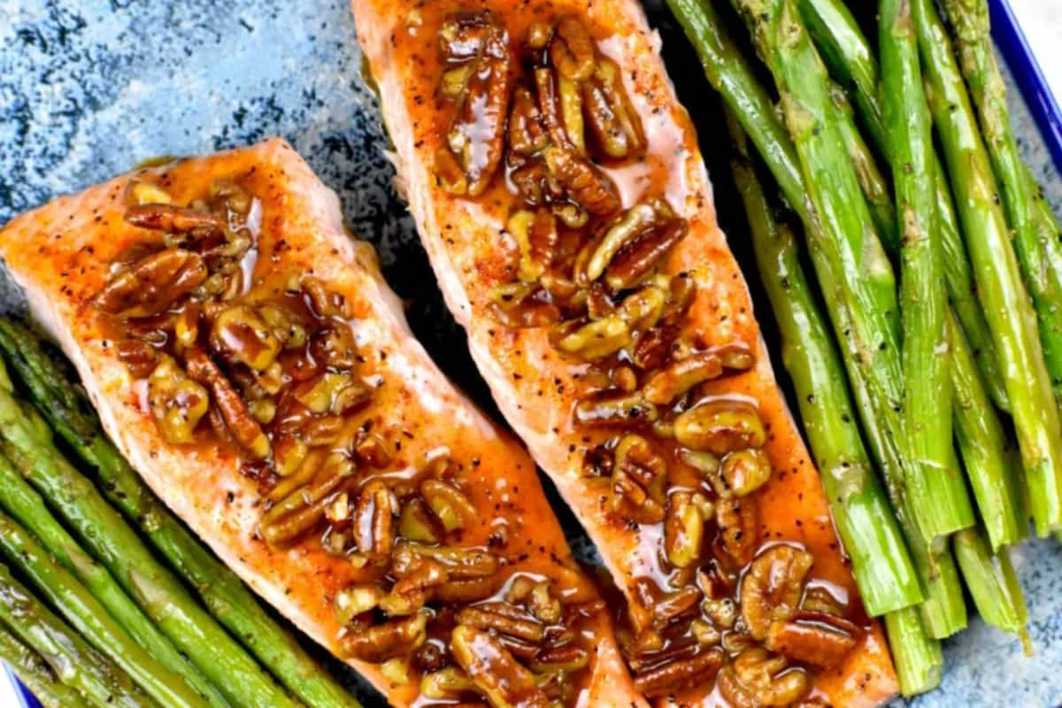 A plate of sheet pan maple pecan salmon.