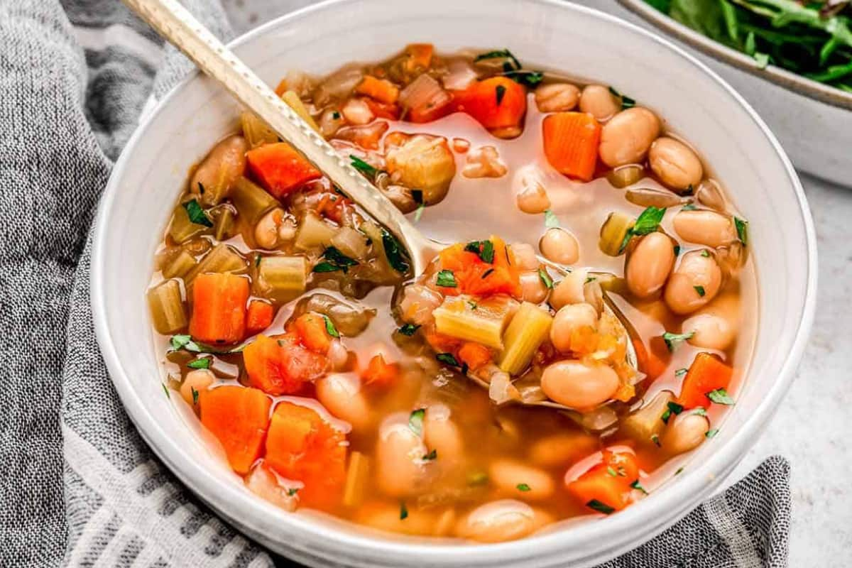 A bowl of slow cooker white bean soup.