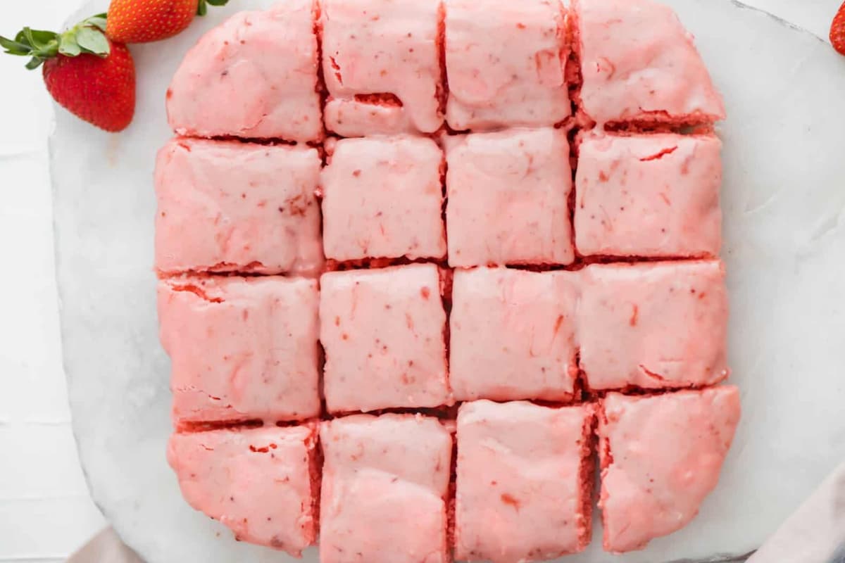 A plate of strawberry brownies.