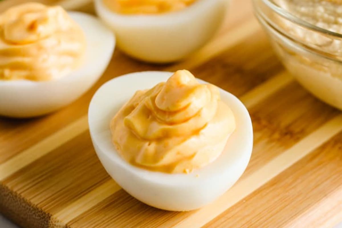 A plate of hummus deviled eggs.