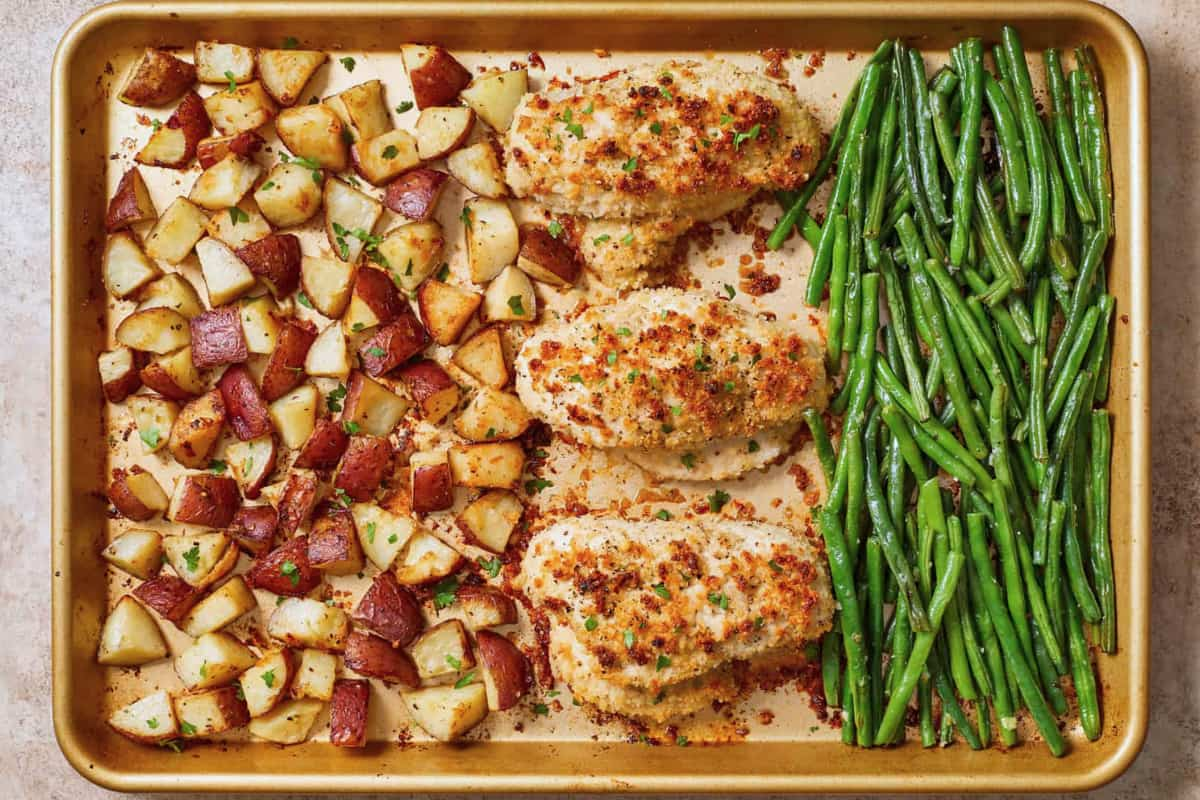 Overhead image of parmesan crusted sheet pan chicken dinner.