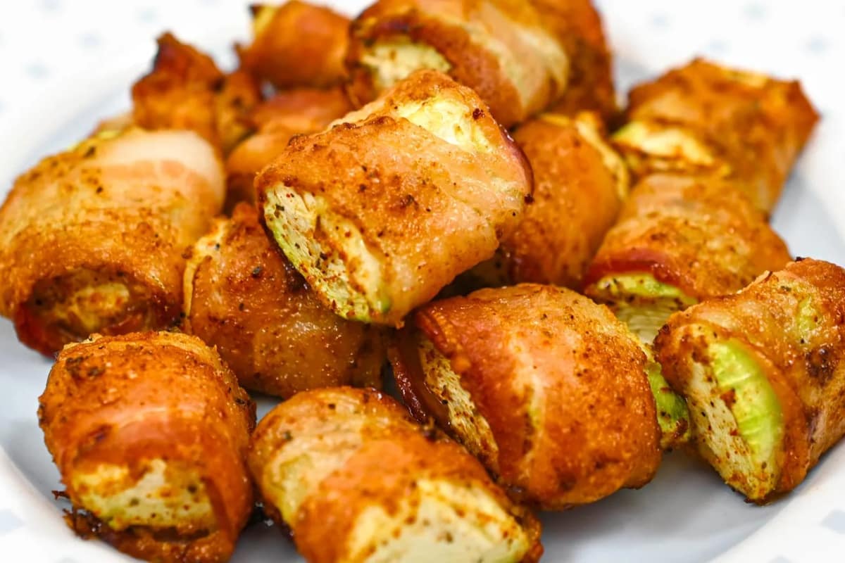A plate of Air Fryer Bacon Wrapped Zucchini.