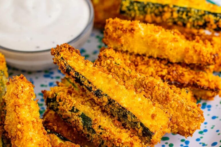 A plate of Crispy Breaded Air Fryer Zucchini Fries.