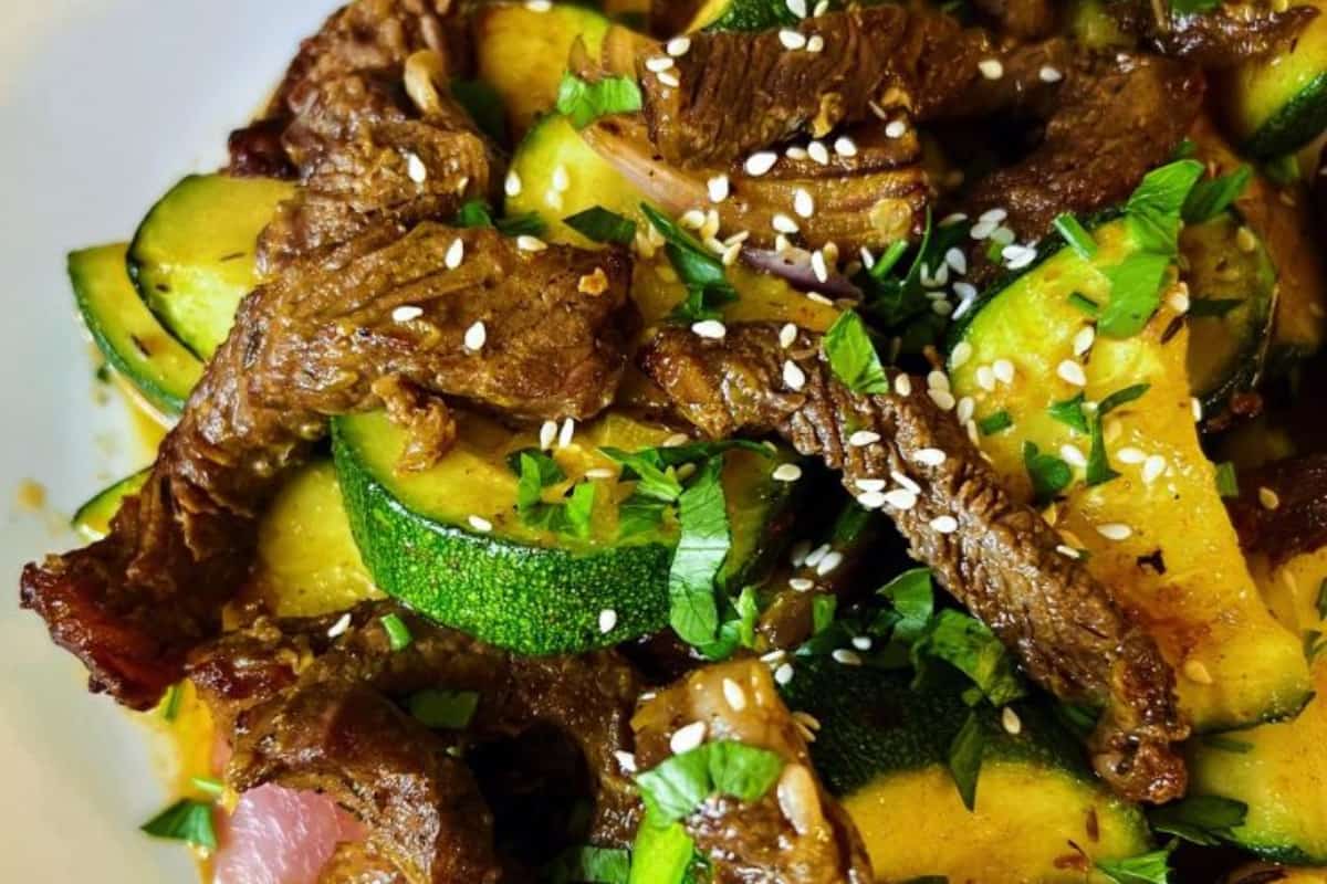 A plate of Air Fryer Ribeye Steak and Zucchini.