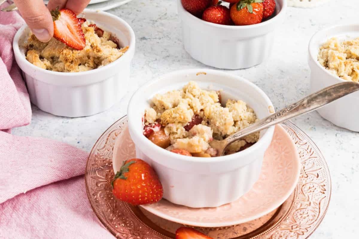 A dish of Mini Apple Strawberry Almond Flour Crumble.